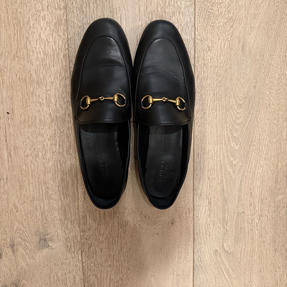 Gucci Black Leather Flats with Gold Detail